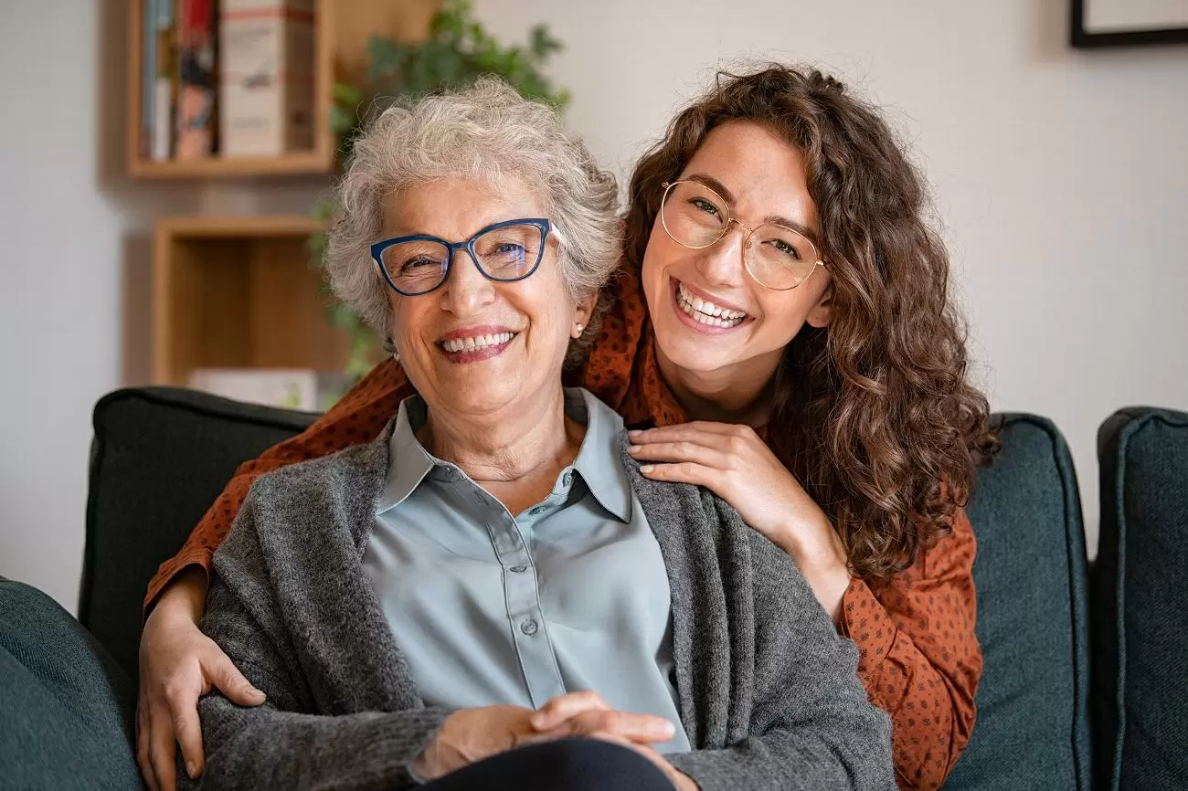 Carer and person supported sharing time together at home